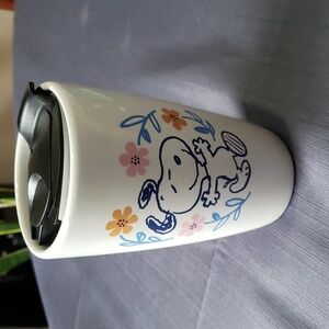Snoopy with Flowers ceramic Travel Mug with Black Lid.  Peanuts.